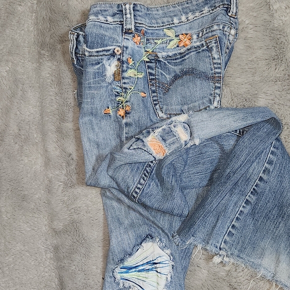 Whimsical vintage floral-embroidered low rise flares